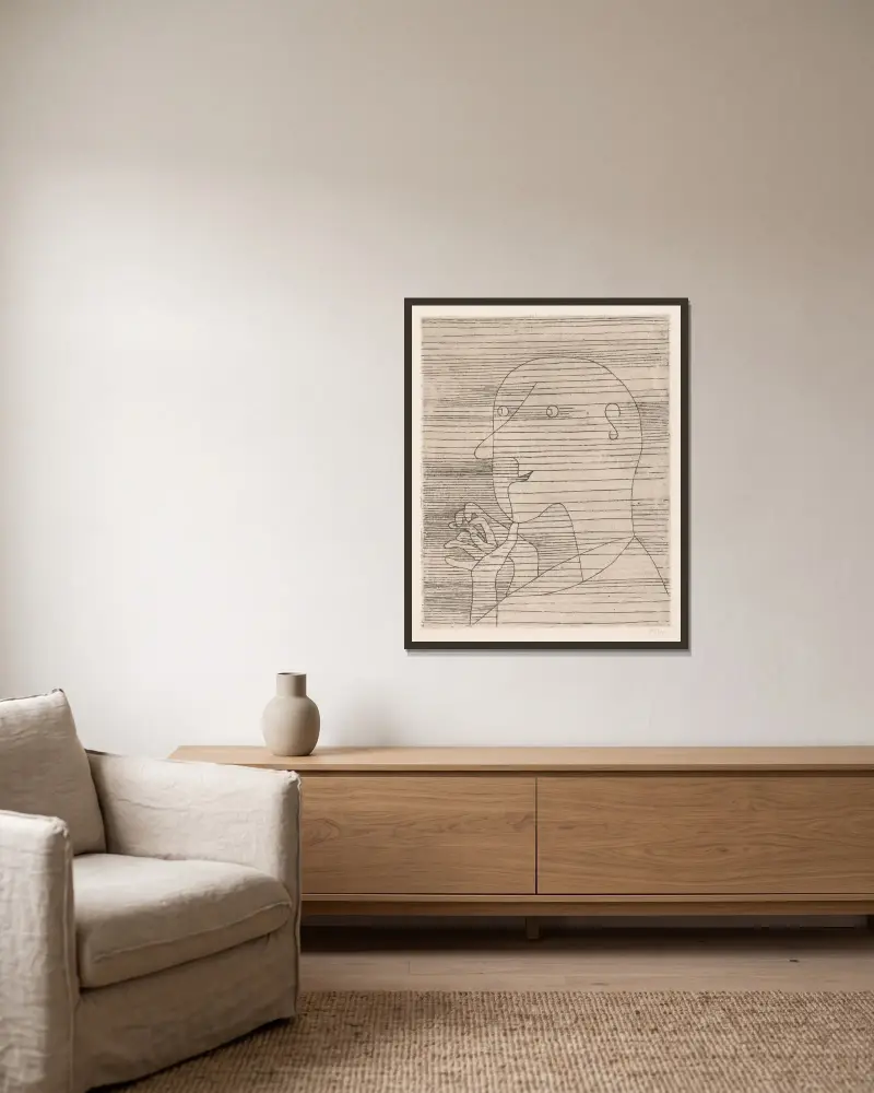 Der rechnende Greis von Paul Klee gerahmt an einer Wand
