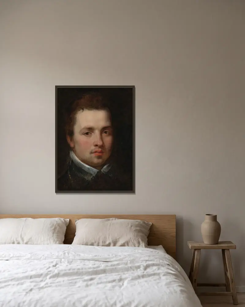 Portrait of a Young Man av Peter Paul Rubens inramad på en vägg