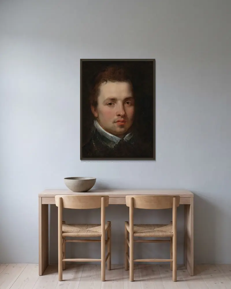 Portrait of a Young Man av Peter Paul Rubens inramad på en vägg