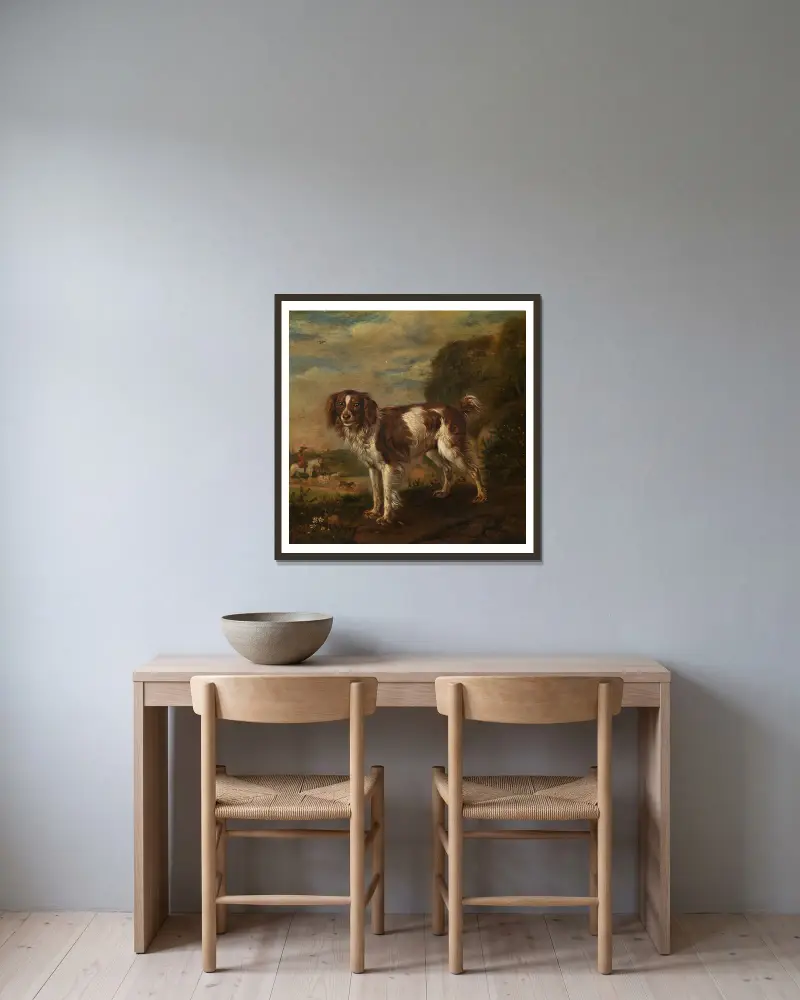 Ein Spaniel von Paulus Potter gerahmt an einer Wand