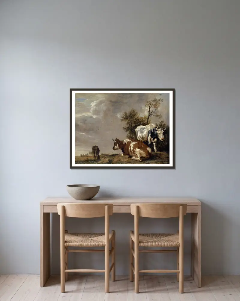 Drei Kühe auf einer Weide von Paulus Potter gerahmt an einer Wand