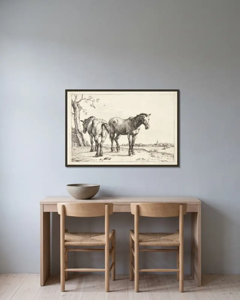 To pløjeheste av Paulus Potter inramad på en vägg