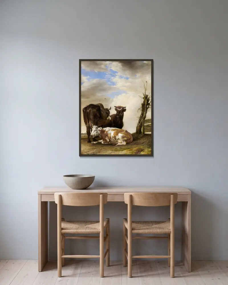 Två kor och en ung tjur vid ett staket på en äng av Paulus Potter inramad på en vägg