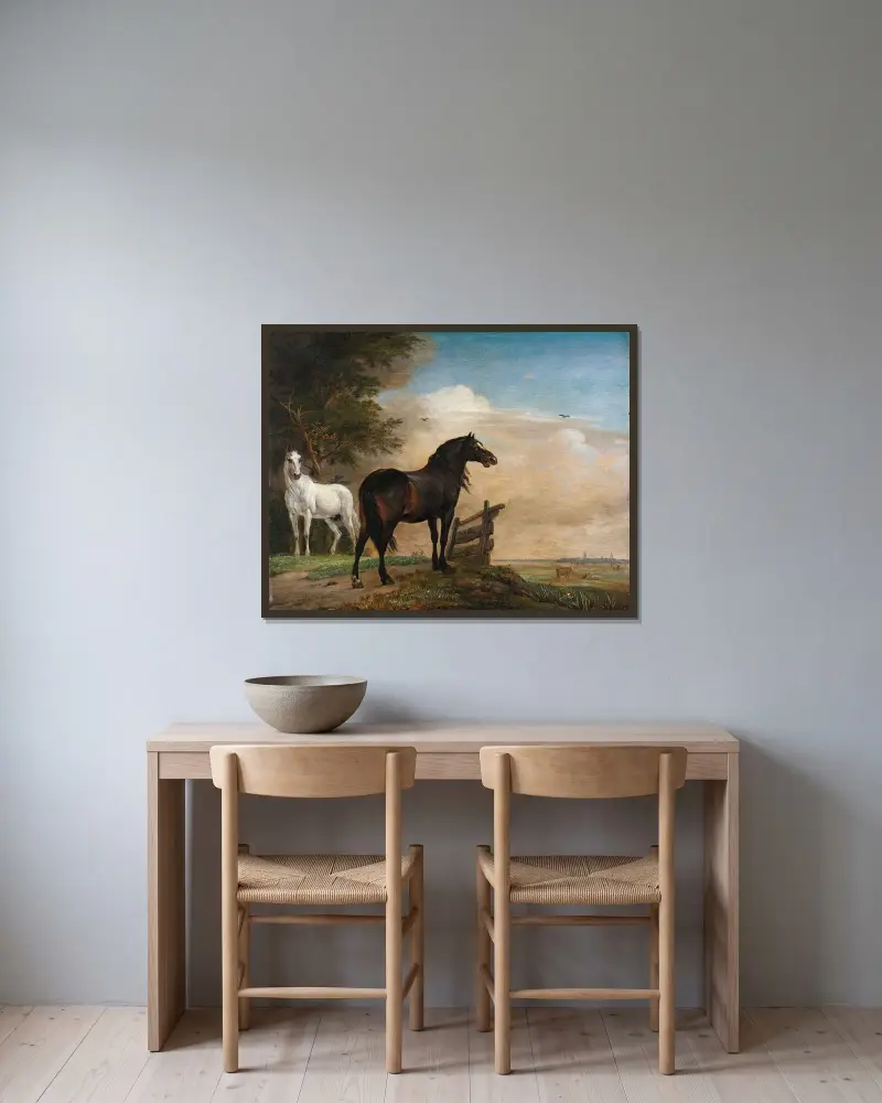 Zwei Pferde auf einer Wiese an einem Tor von Paulus Potter gerahmt an einer Wand