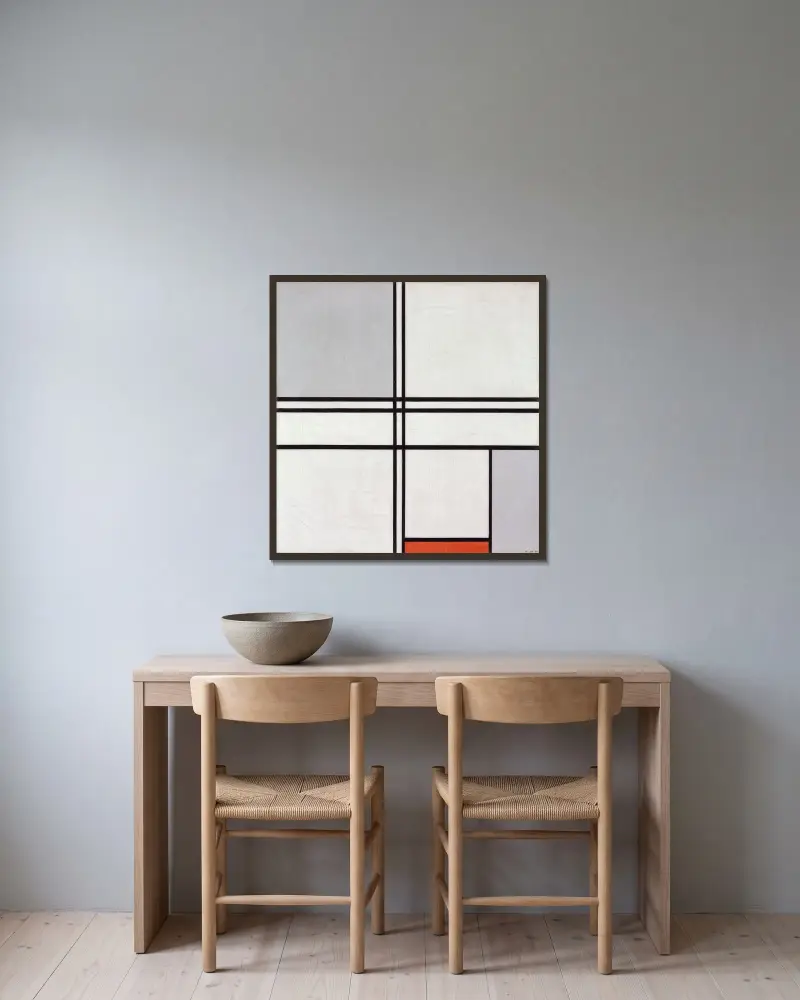 Komposition (nr 1), grå-röd av Piet Mondrian inramad på en vägg