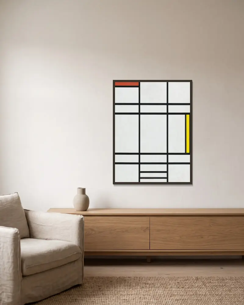 Composition in White, Red, and Yellow av Piet Mondrian inramad på en vägg