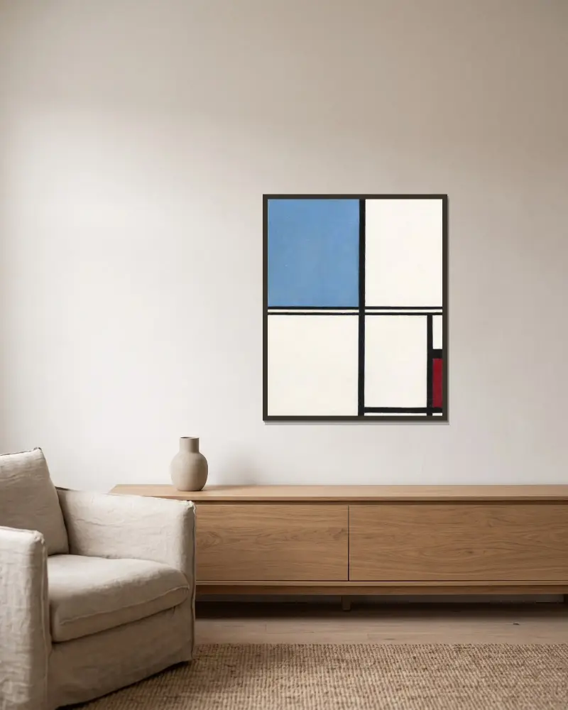 Kompozycja z niebieskim i czerwonym, Piet Mondrian w ramie na ścianie