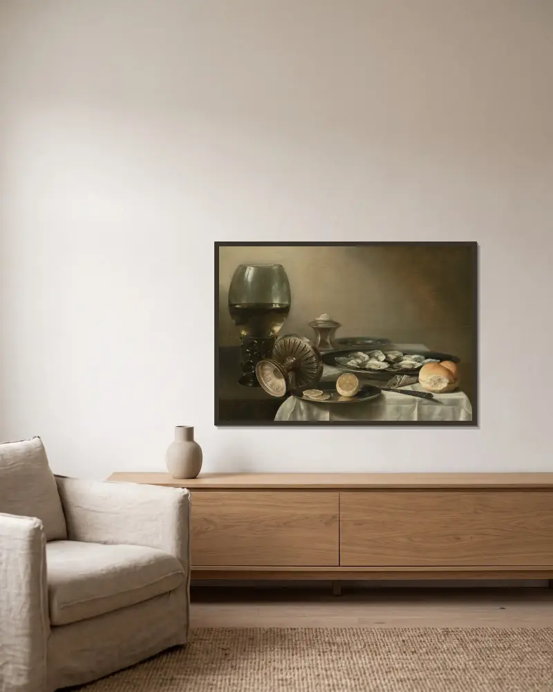 A large roemer, overturned tazza, salt cellar, partially sliced lemon, oysters, pepper, knife and bread on a partially draped table av Pieter Claesz inramad på en vägg
