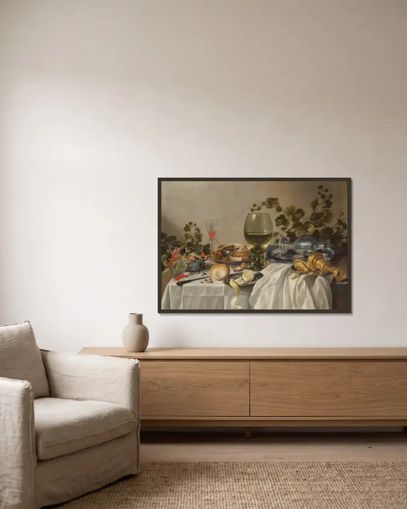 Ontbijt of silver and glassware on a draped table, with vines, fruits and baked goods av Pieter Claesz inramad på en vägg