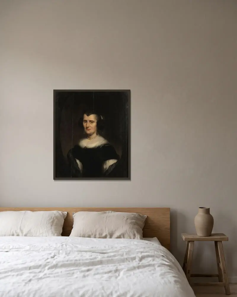 Halvlångt porträtt av en medelålders kvinna av Nicolaes Pietersz. Berchem inramad på en vägg