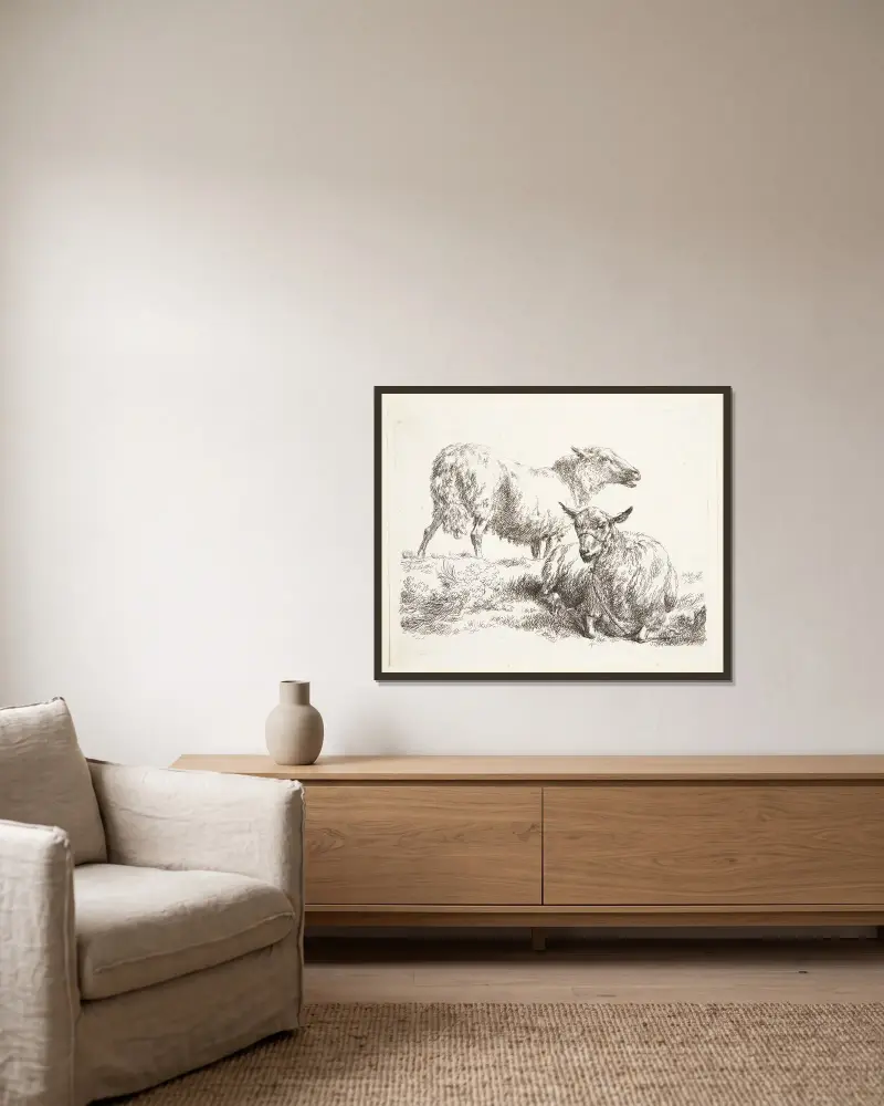Ett stående och ett liggande får av Nicolaes Pietersz. Berchem inramad på en vägg
