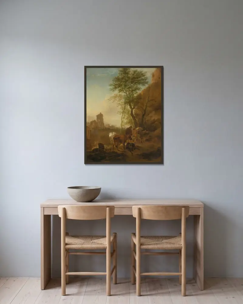 Italienskt landskap med kor av Nicolaes Pietersz. Berchem inramad på en vägg