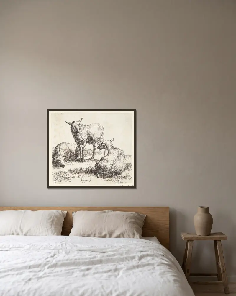 Två liggande och en stående får av Nicolaes Pietersz. Berchem inramad på en vägg