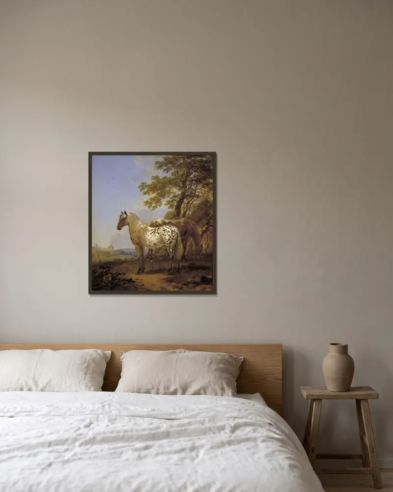 Två hästar i ett landskap av Nicolaes Pietersz. Berchem inramad på en vägg
