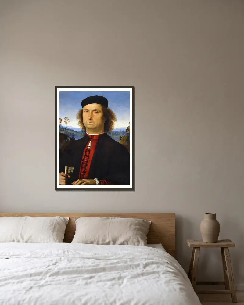 Portrait of Francesco delle Opere av Pietro Perugino inramad på en vägg