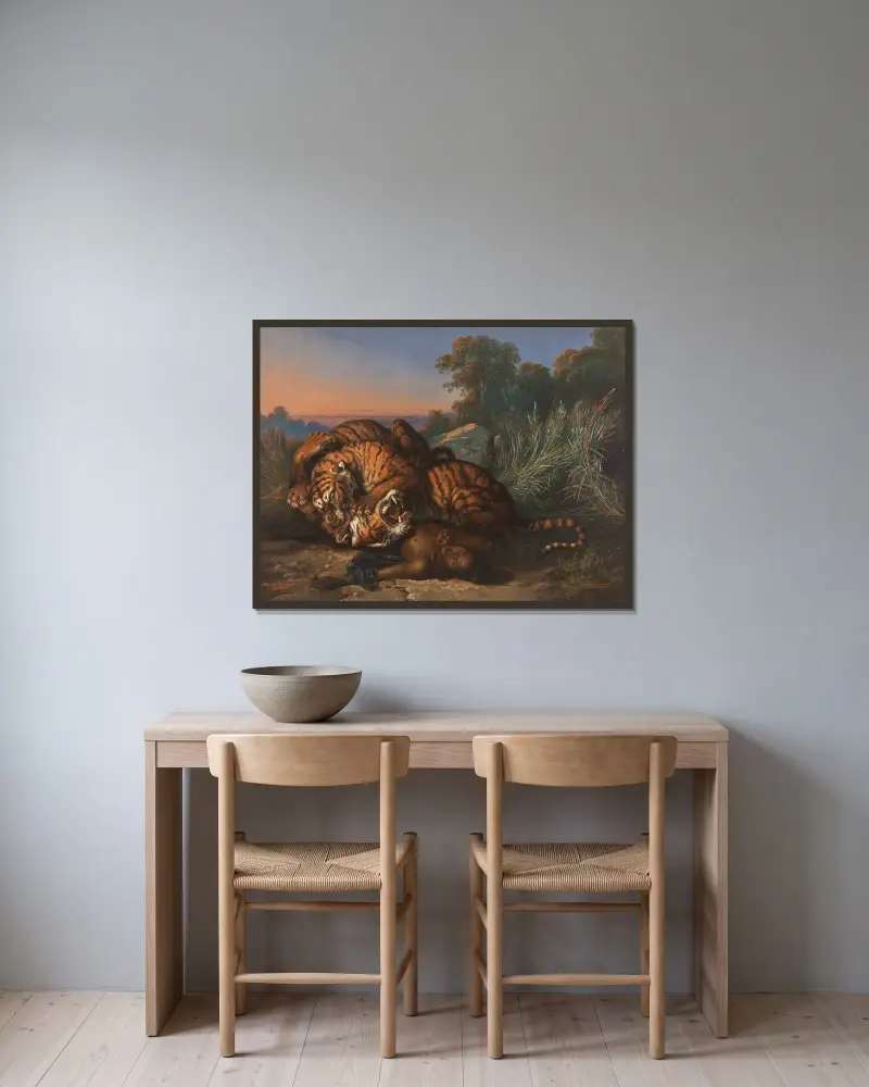 Kämpfende Tiger von Raden Saleh gerahmt an einer Wand