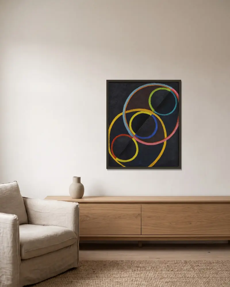 Svart relief med färgcirklar av Robert Delaunay inramad på en vägg