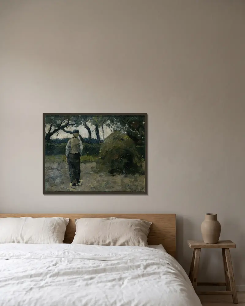 En bonde vid en höstack av Richard Nicolaüs Roland Holst inramad på en vägg