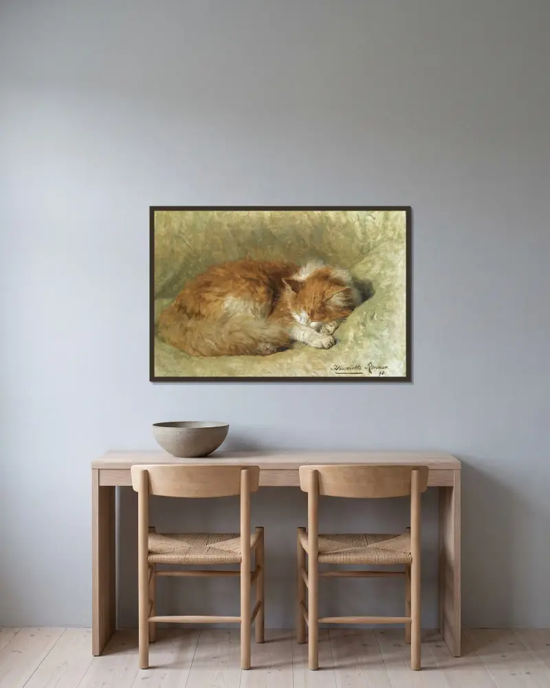 En sovande katt av Henriëtte Ronner-Knip inramad på en vägg