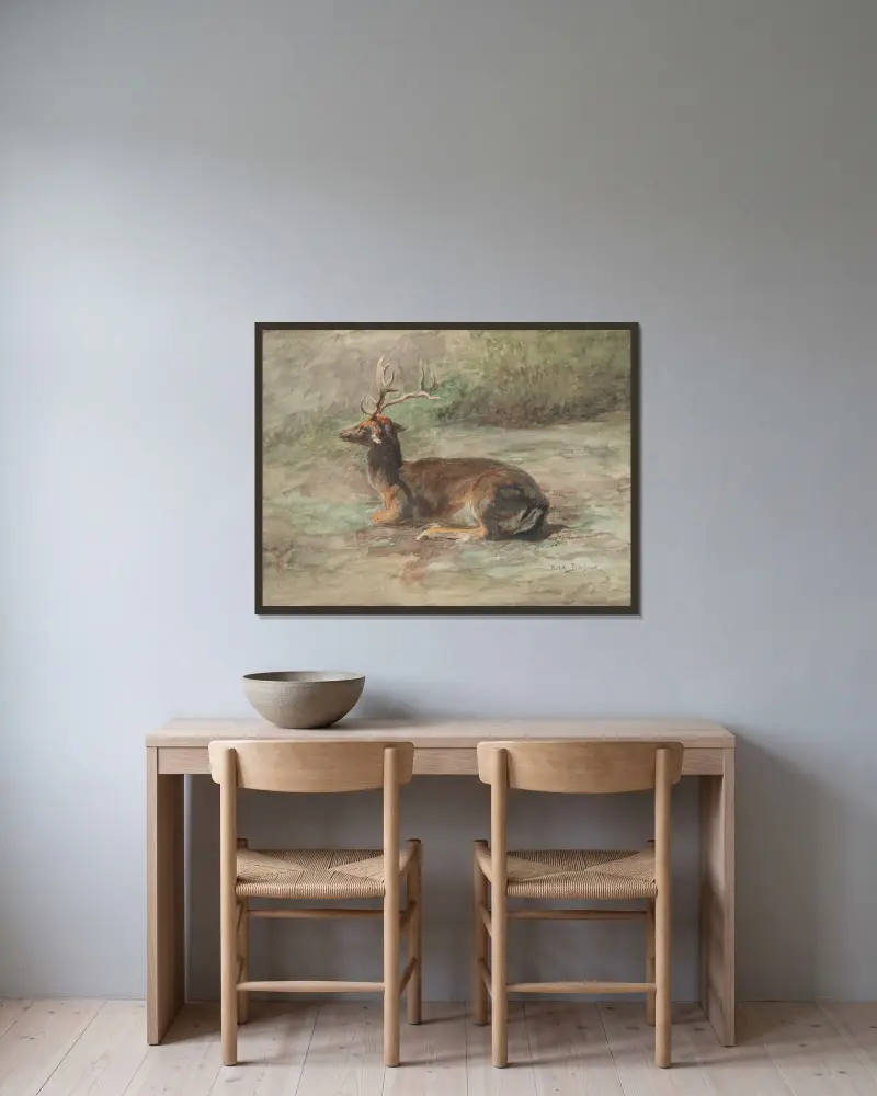 Liegender Hirsch von Rosa Bonheur gerahmt an einer Wand