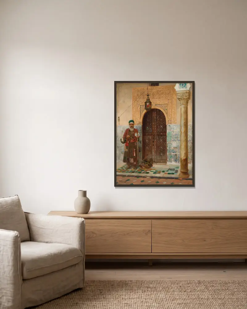 A holy man by an entrance av Rudolf Ernst inramad på en vägg
