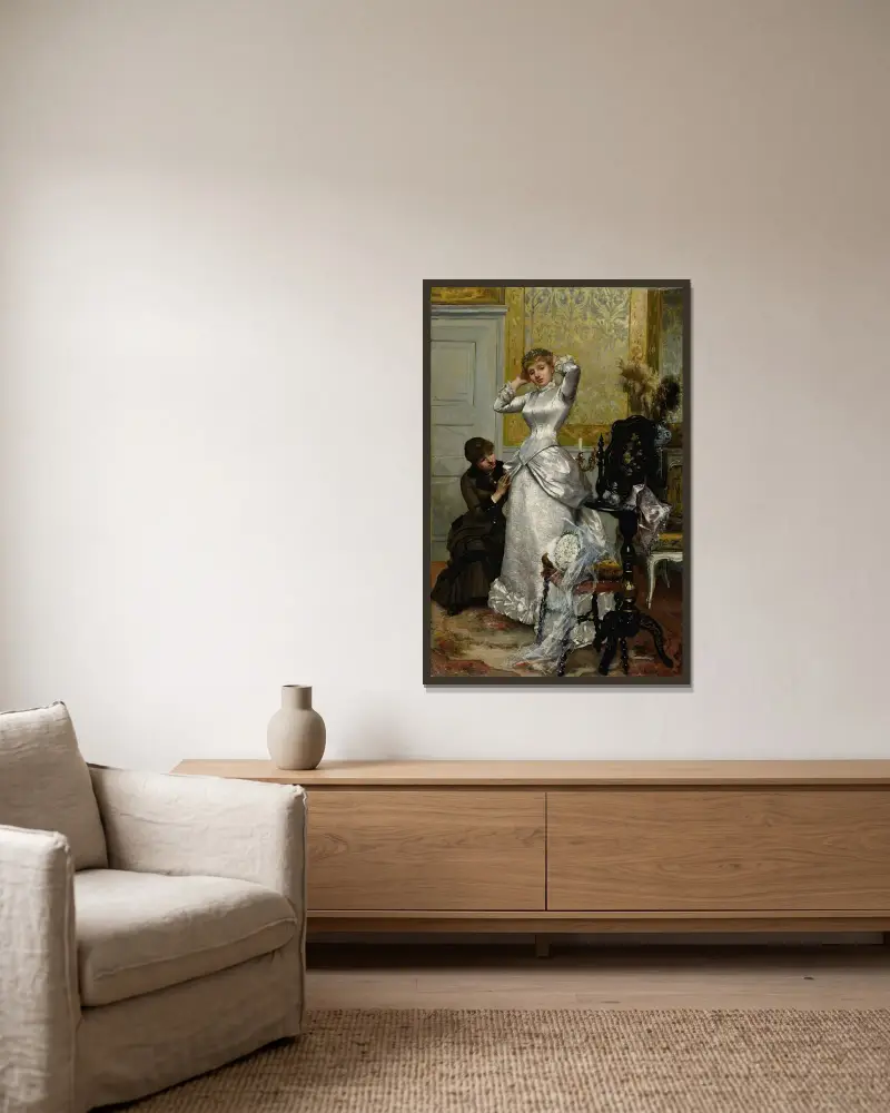Das Ankleiden der Braut von Rudolf Ernst gerahmt an einer Wand