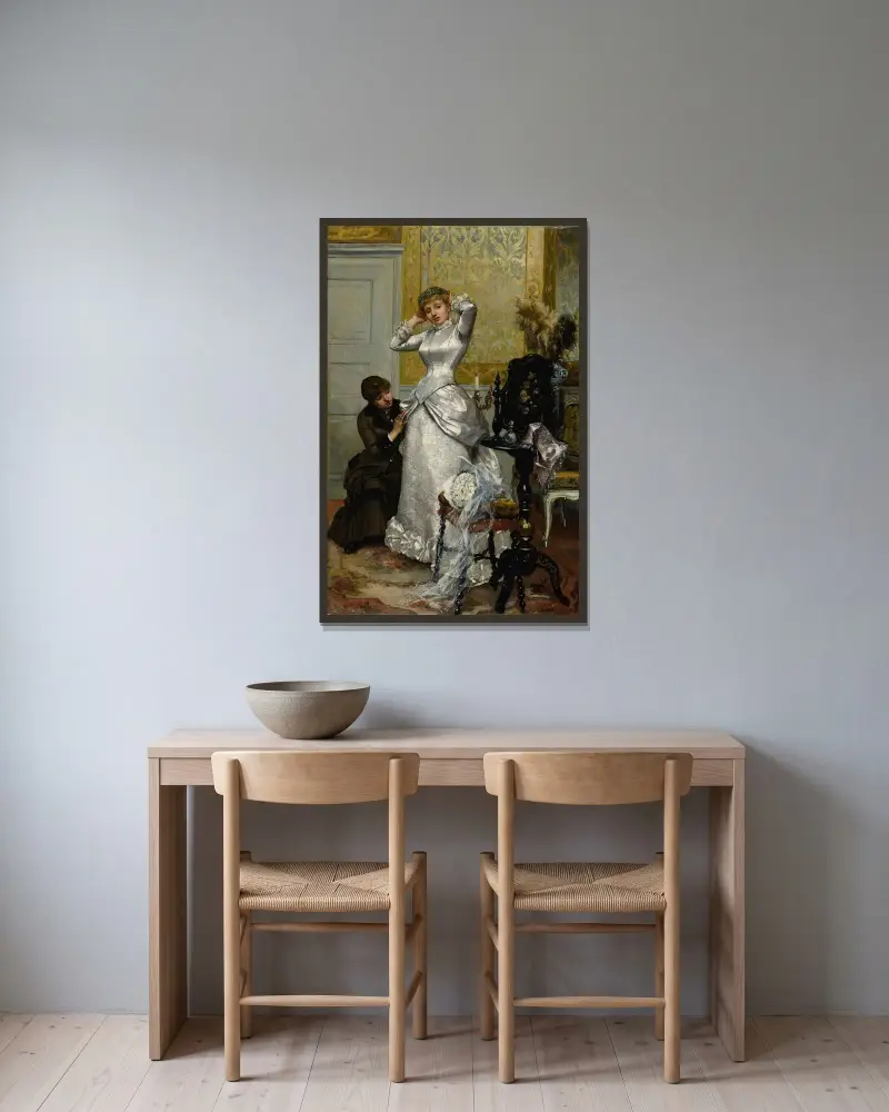 Das Ankleiden der Braut von Rudolf Ernst gerahmt an einer Wand
