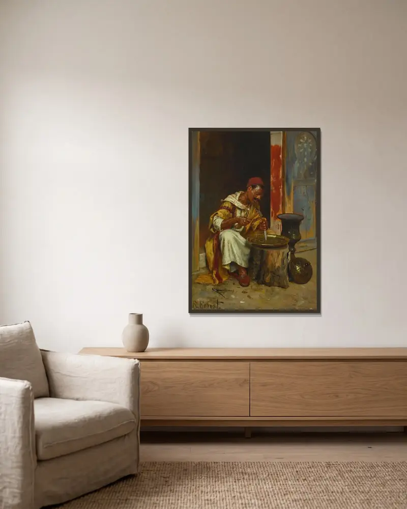 Der Messingarbeiter von Rudolf Ernst gerahmt an einer Wand