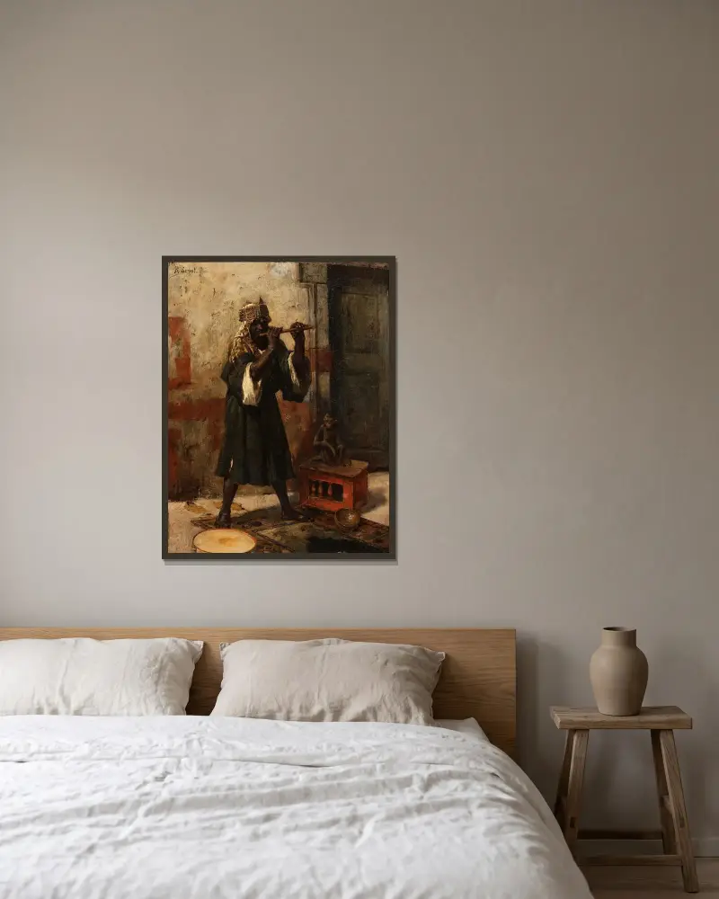 Der Schlangenbeschwörer von Rudolf Ernst gerahmt an einer Wand