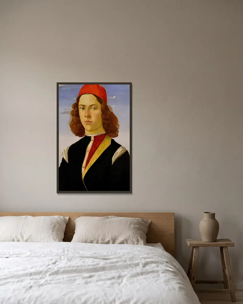 Portrait of a young man av Sandro Botticelli inramad på en vägg