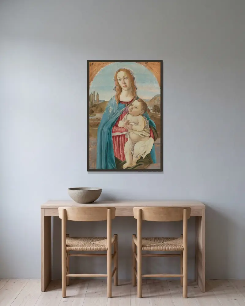 Maria mit dem Kind von Sandro Botticelli gerahmt an einer Wand