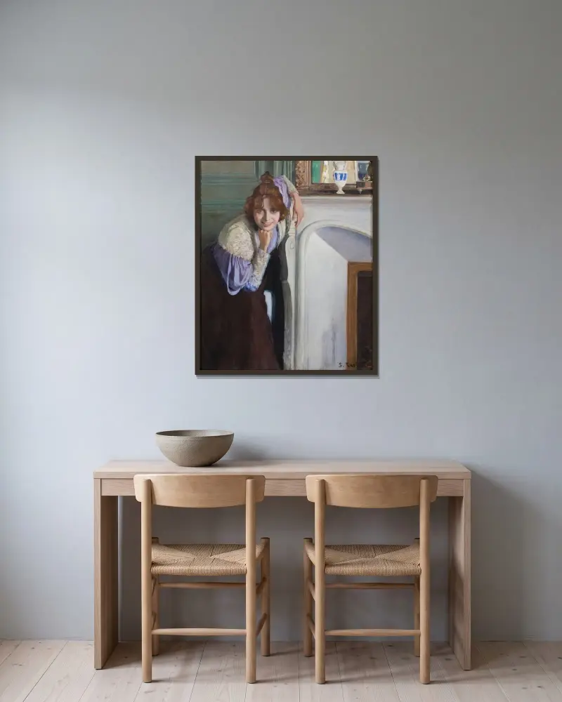 Leende flicka av Santiago Rusiñol inramad på en vägg