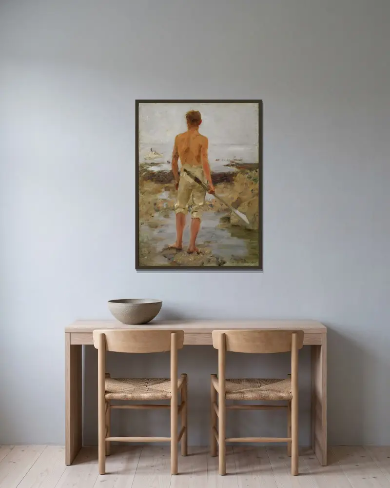 Pojke med åra av Henry Scott Tuke inramad på en vägg