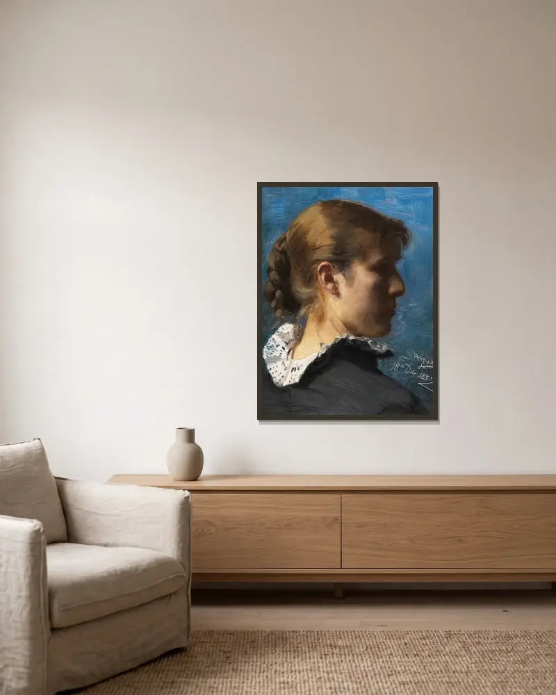 Portrait of a young woman in profile av Peder Severin Krøyer inramad på en vägg