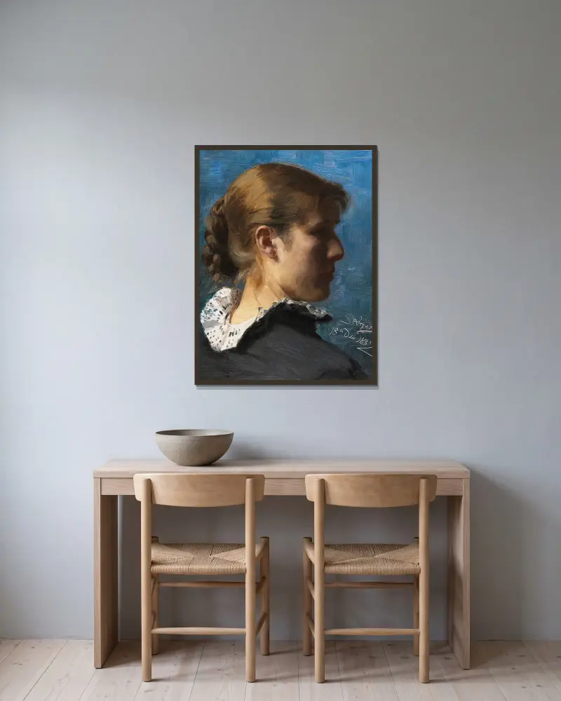 Portrait of a young woman in profile av Peder Severin Krøyer inramad på en vägg