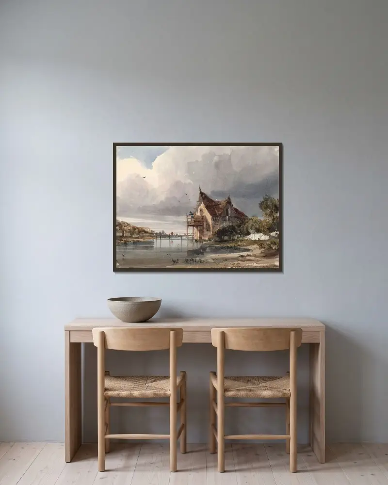 En flod och stuga med vit staket av Thomas Shotter Boys inramad på en vägg