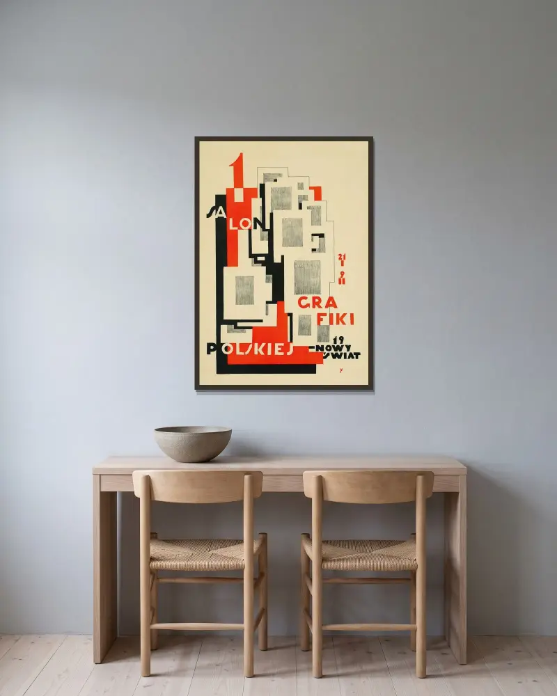 1. Salon Grafiki Polskiej. 21 I – 9 II. Nowy Świat 19, Tadeusz Cieślewski w ramie na ścianie