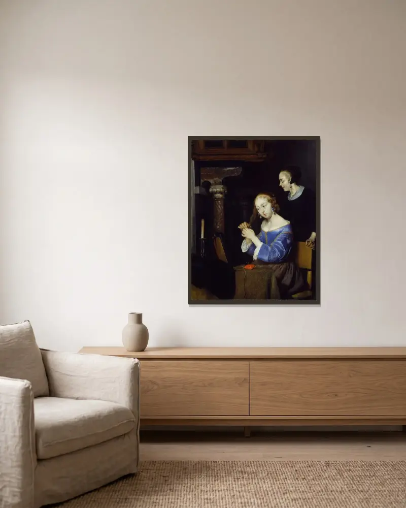 Dam som kammar sitt hår av Gerard ter Borch inramad på en vägg