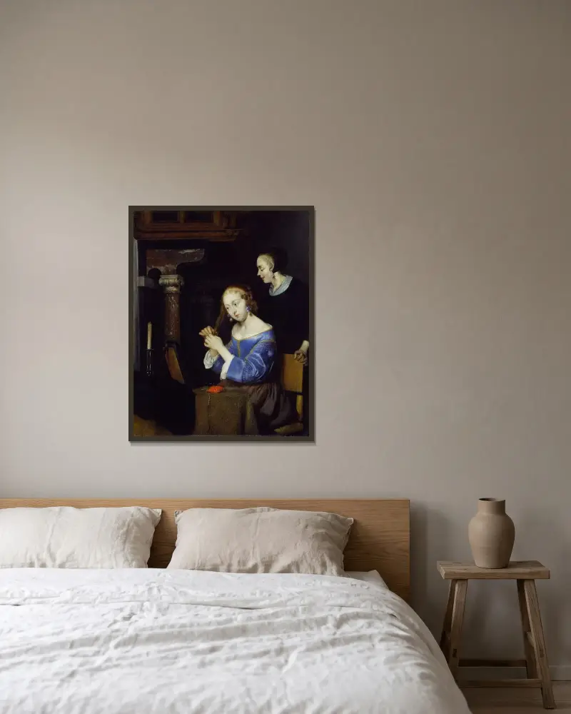 Dam som kammar sitt hår av Gerard ter Borch inramad på en vägg
