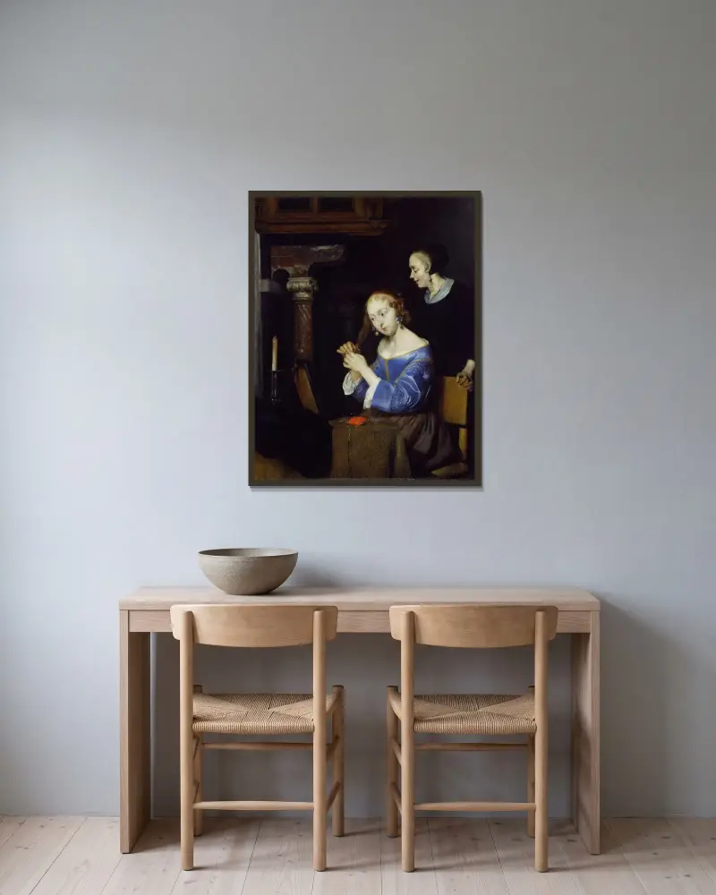 Dam som kammar sitt hår av Gerard ter Borch inramad på en vägg