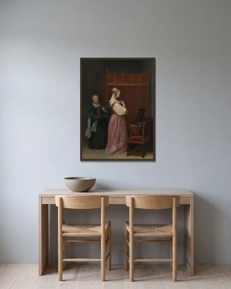 Ung kvinna vid sin toalett med en tjänarinna av Gerard ter Borch inramad på en vägg