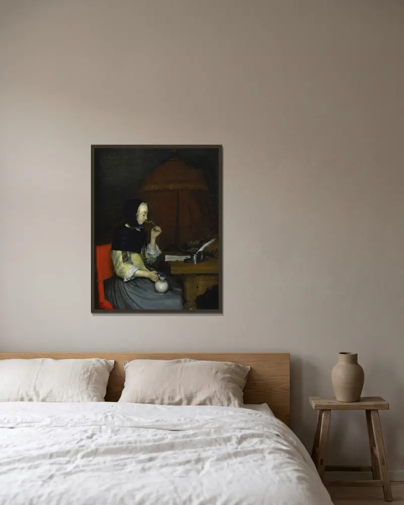Kvinna med vinglas av Gerard ter Borch inramad på en vägg