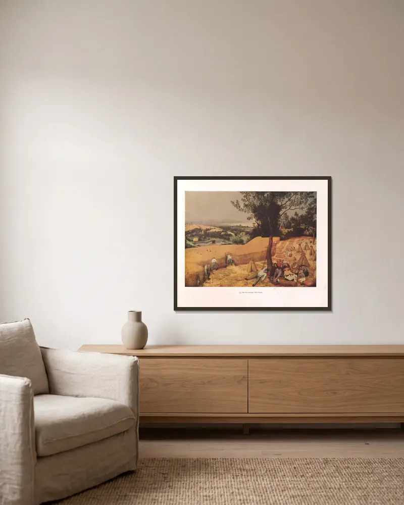 Die Kornernte von Pieter Bruegel The Elder gerahmt an einer Wand