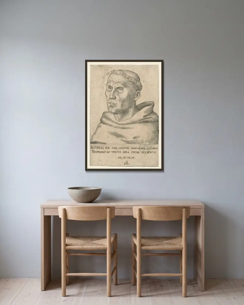 Portrait of Martin Luther as an Augustinian Monk av Lucas Cranach the Elder inramad på en vägg