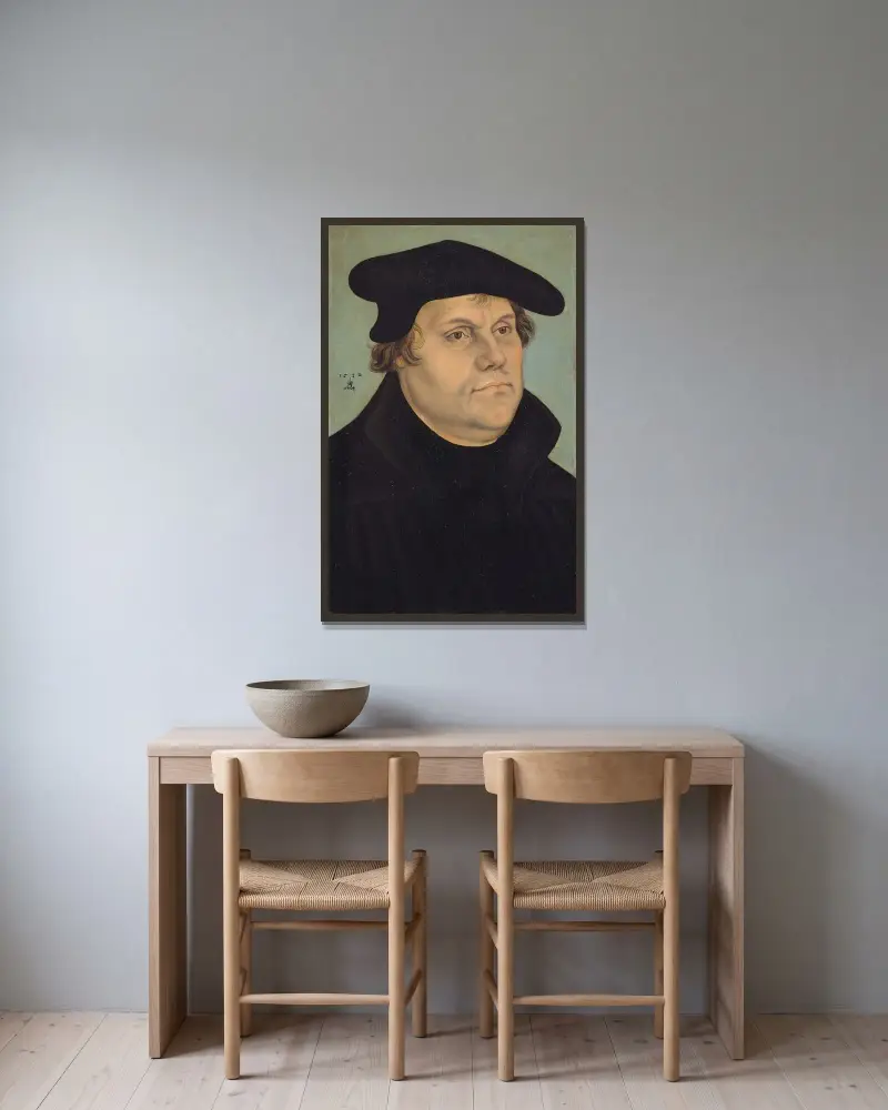 Portrait of Martin Luther av Lucas Cranach the Elder inramad på en vägg
