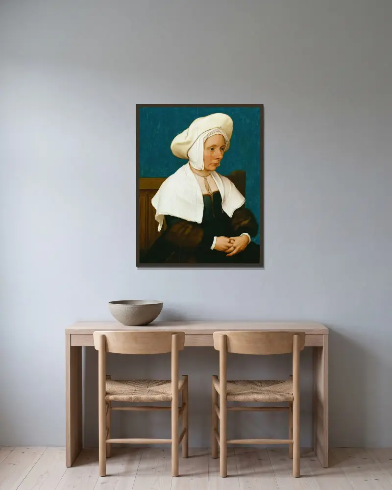 Portrait of a Woman av Hans Holbein The Younger inramad på en vägg