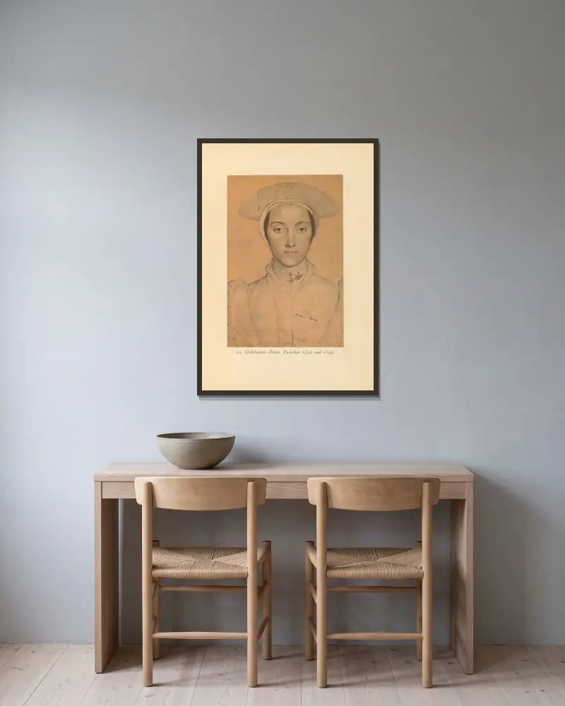 Unbekannte Dame mit breitem Hut av Hans Holbein The Younger inramad på en vägg