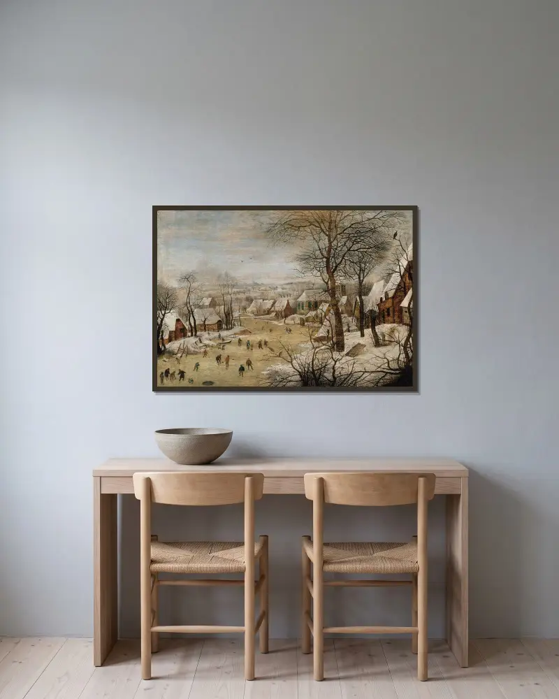 Winterlandschaft mit Schlittschuhläufern und einer Vogelfalle von Pieter Brueghel The Younger gerahmt an einer Wand