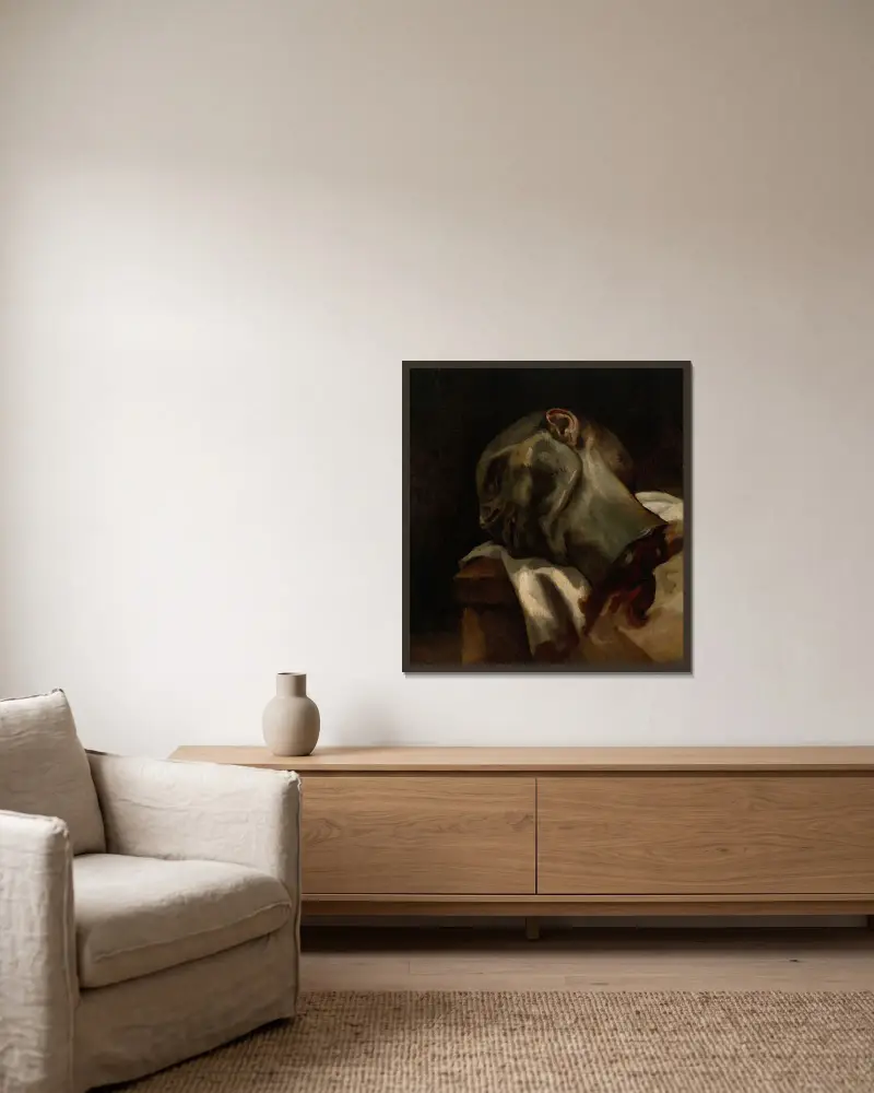 Huvud av en giljotinerad man av Théodore Géricault inramad på en vägg