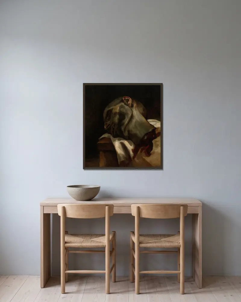 Huvud av en giljotinerad man av Théodore Géricault inramad på en vägg
